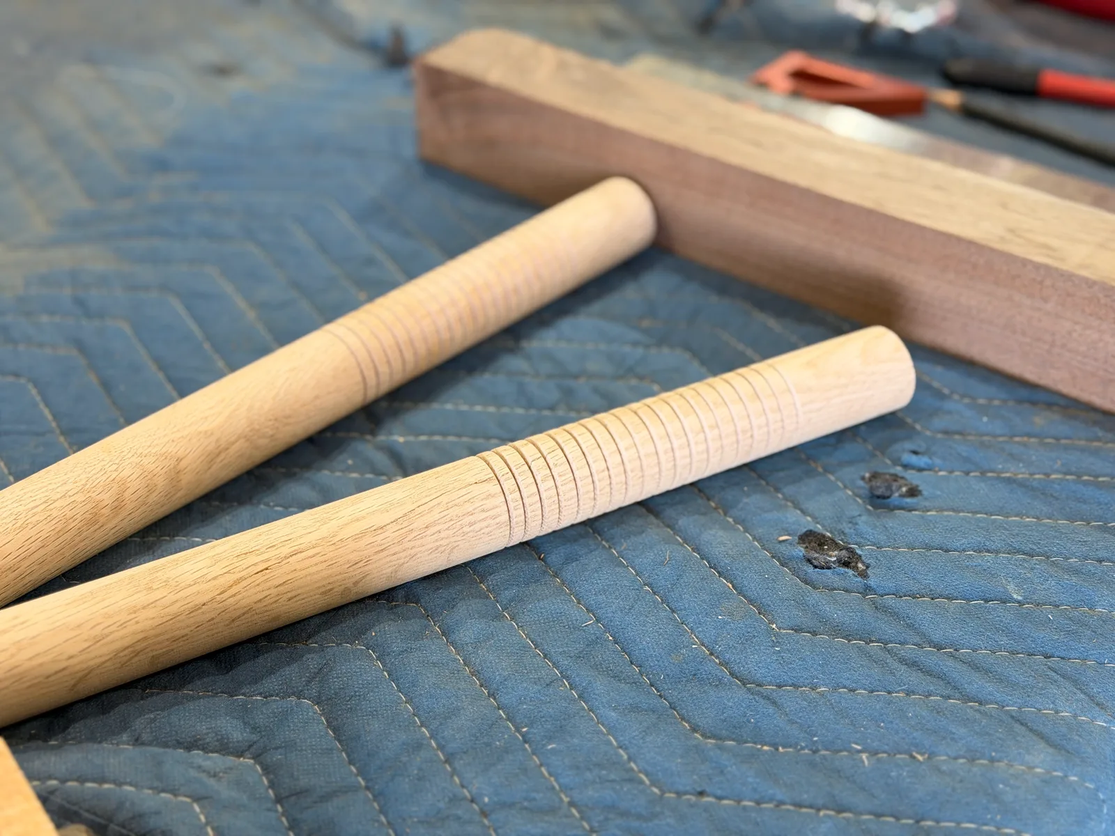 A pair of hand-turned hardwood nunchuck handles
